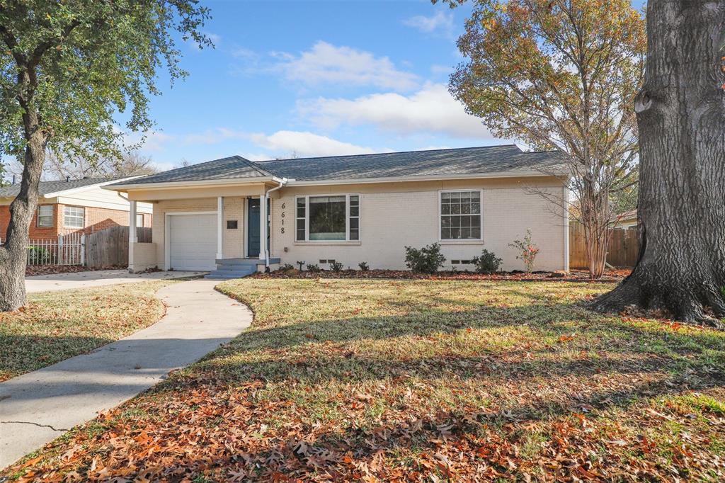 a view of a house with snow on the background