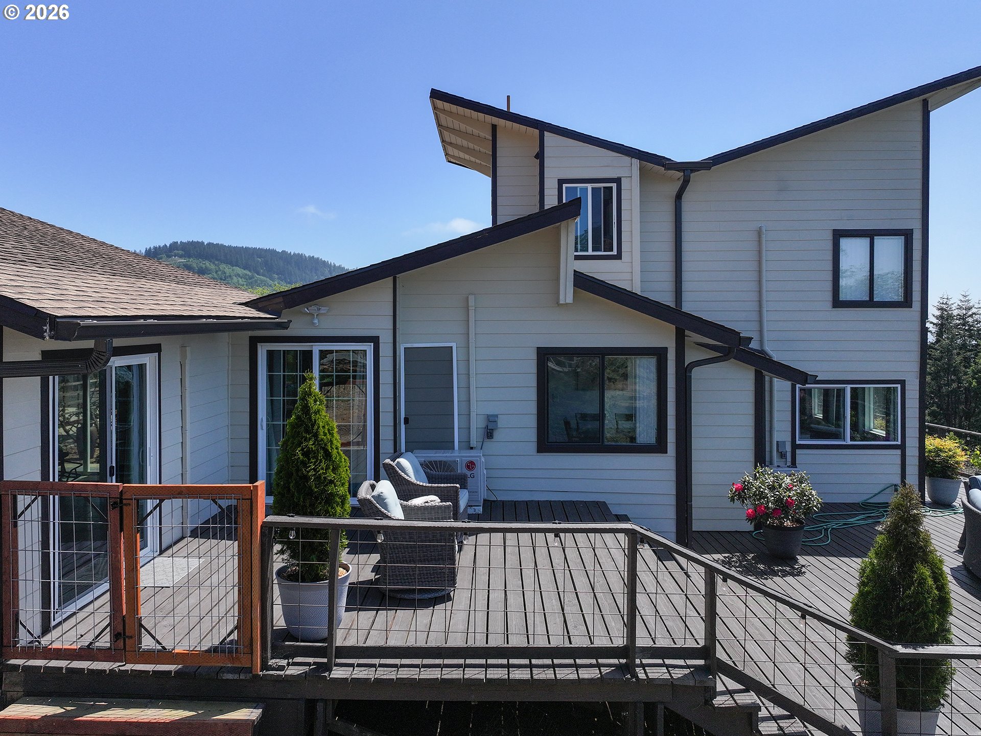 895 Marina Heights Road Brookings, OR 97415 - Photo 42 of 48 a view of house with outdoor seating space