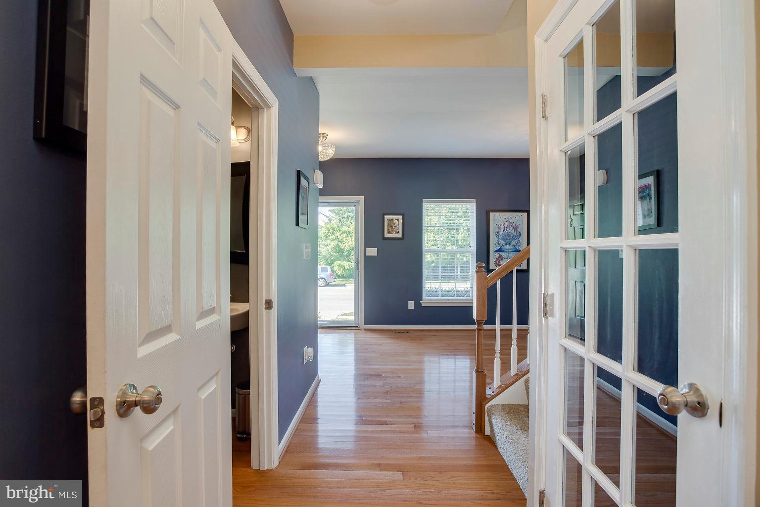 5612 New Forge Road White Marsh, MD 21162 - Photo 24 of 61 HALLWAY BETWEEN DINING ROOM AND LIVING ROOM