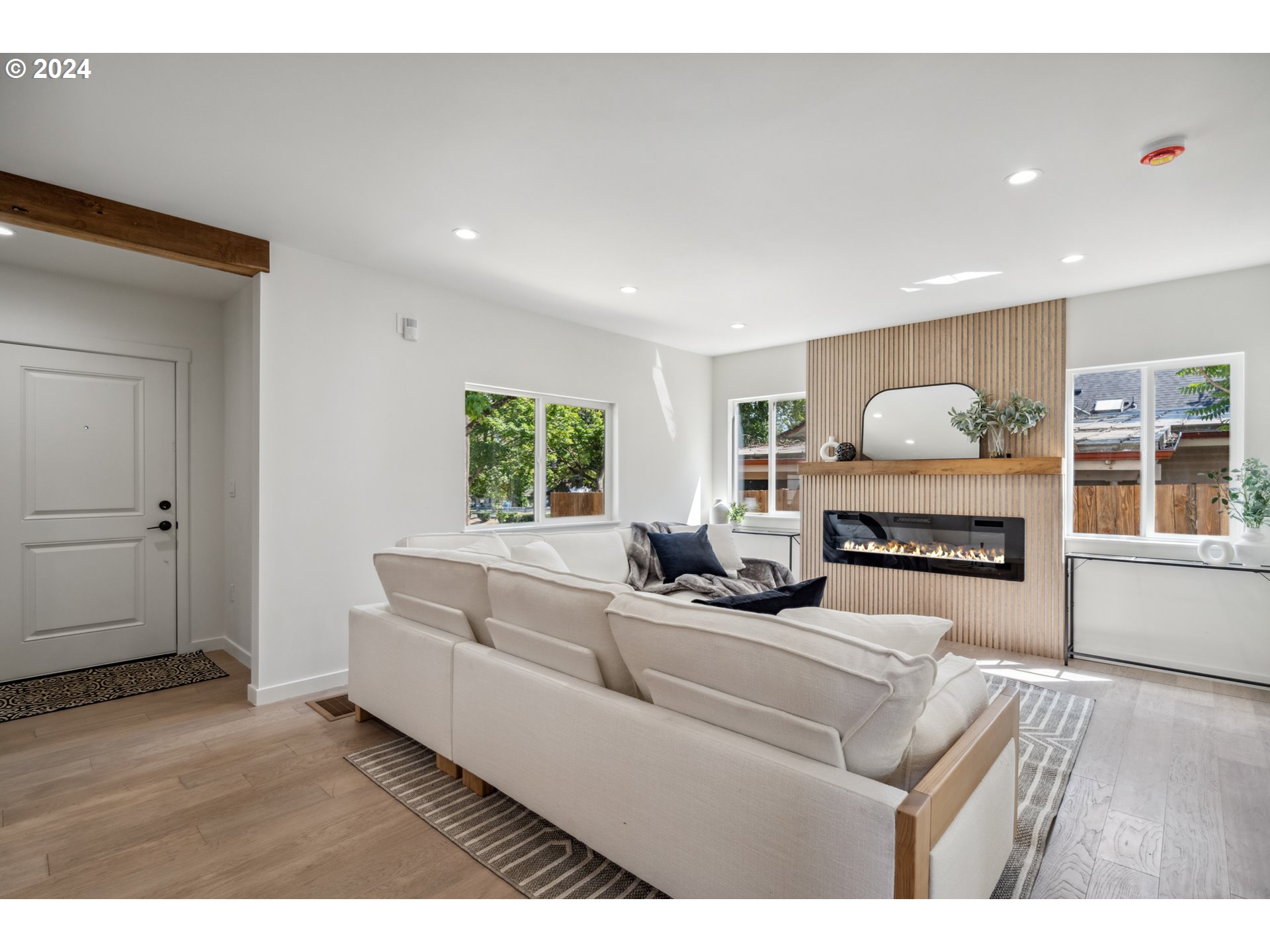 2904 R Street Vancouver, WA 98663 - Photo 14 of 46 a living room with furniture and a fireplace