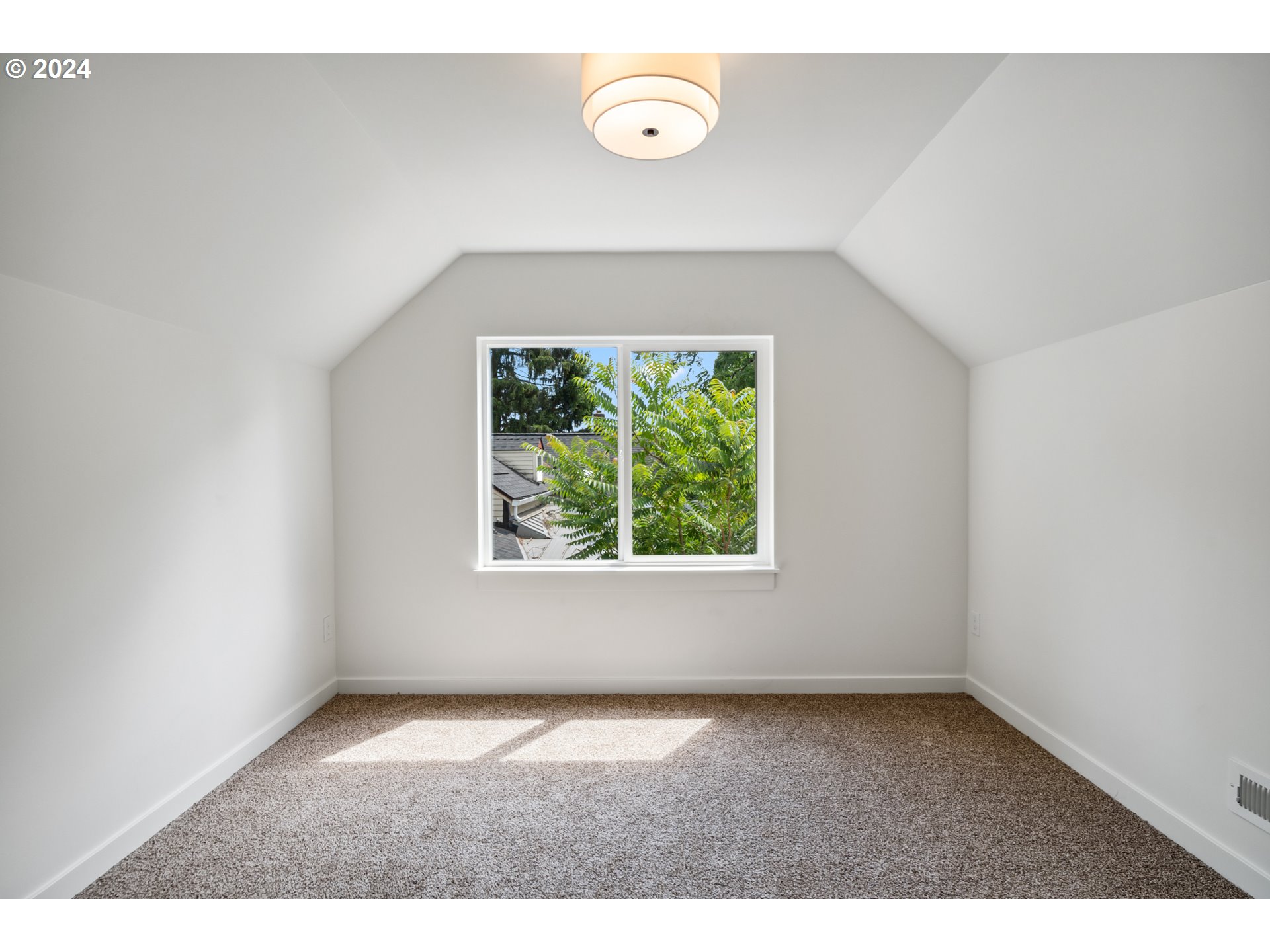 2904 R Street Vancouver, WA 98663 - Photo 22 of 46 a view of an empty room with a window
