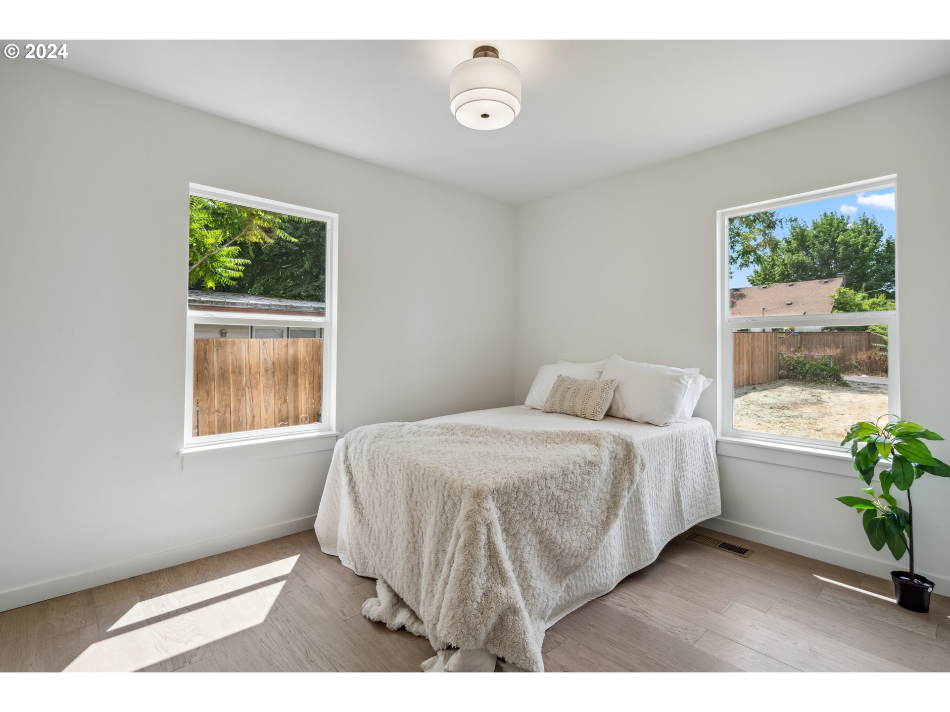 2904 R Street Vancouver, WA 98663 - Photo 28 of 46 a bedroom with a bed and a window