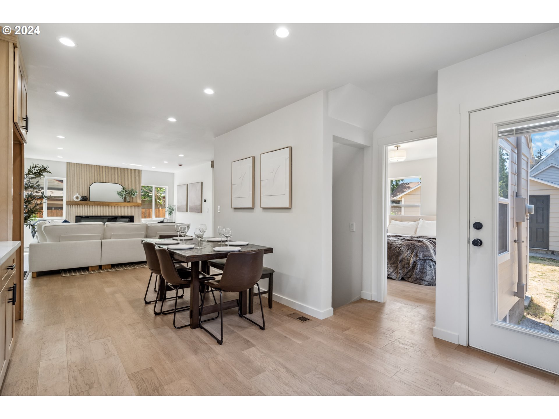 2904 R Street Vancouver, WA 98663 - Photo 3 of 46 a living room with furniture a dining table and a large window