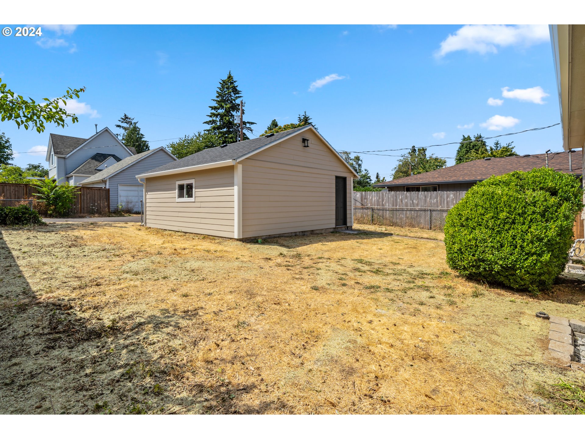 2904 R Street Vancouver, WA 98663 - Photo 35 of 46 a view of a house with a yard