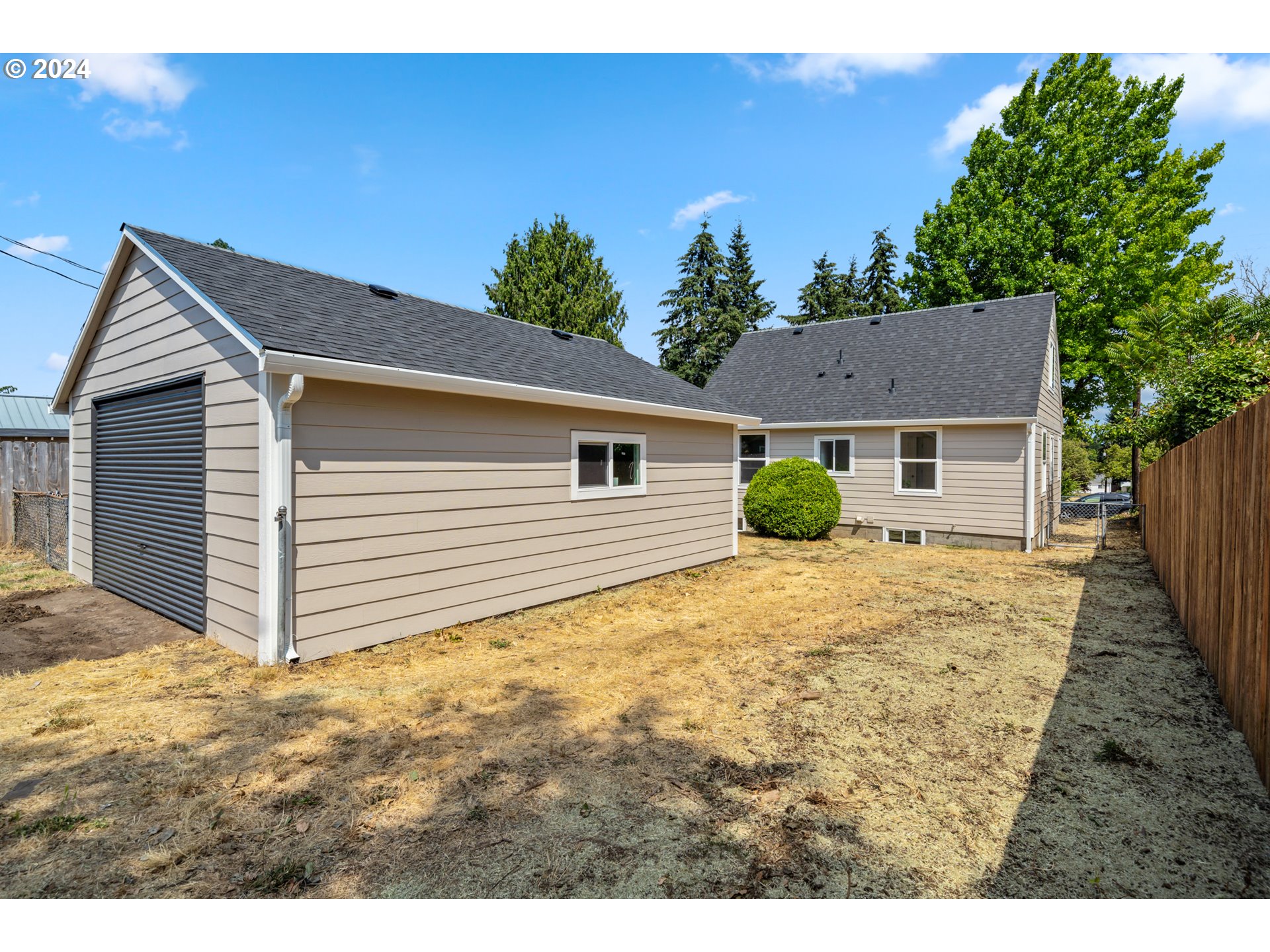 2904 R Street Vancouver, WA 98663 - Photo 37 of 46 a view of a house with a backyard