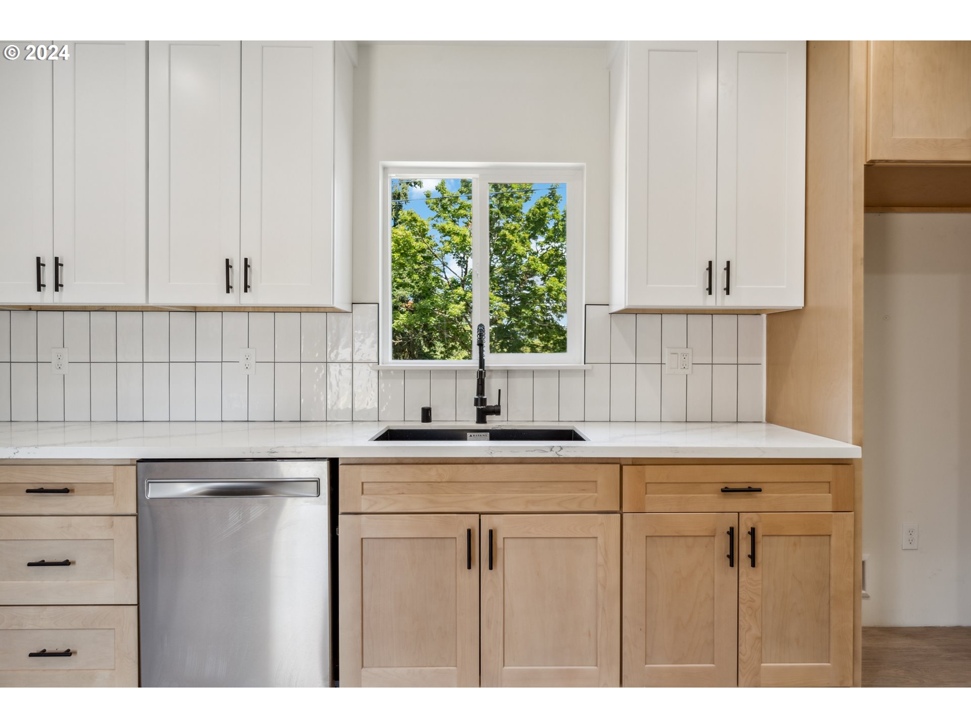 2904 R Street Vancouver, WA 98663 - Photo 39 of 46 a kitchen with appliances cabinets and a window