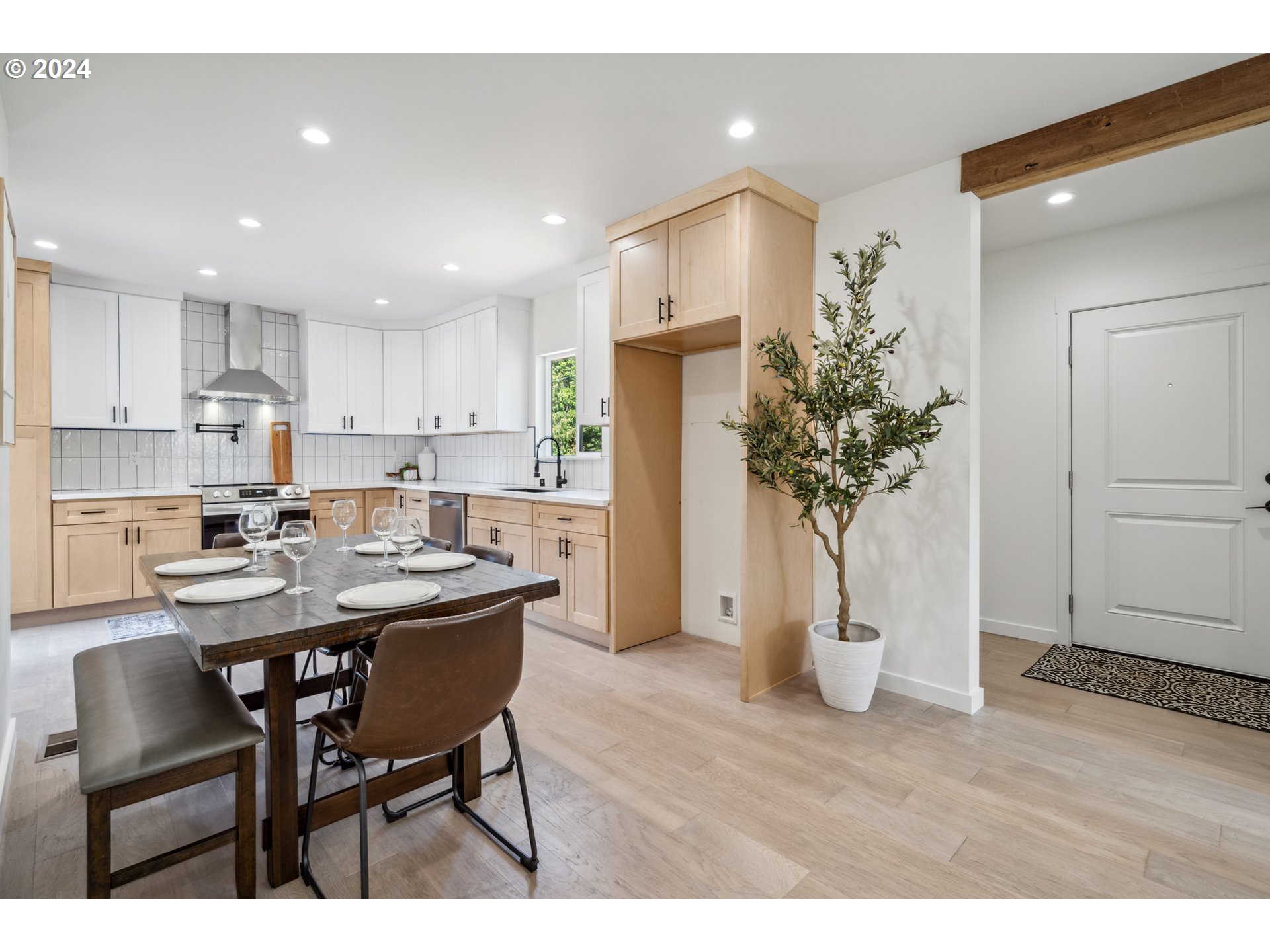 2904 R Street Vancouver, WA 98663 - Photo 45 of 46 a kitchen with a table and chairs in it