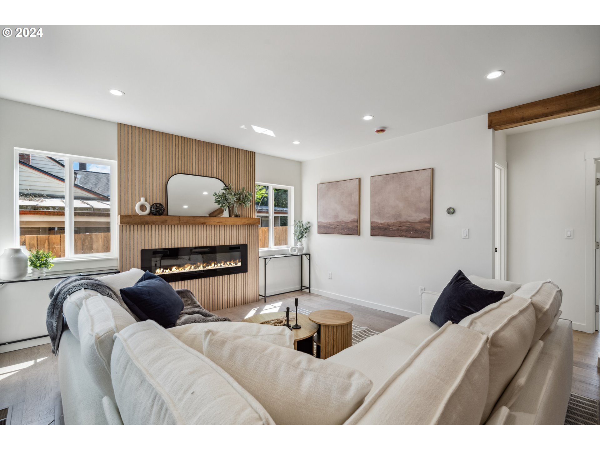 2904 R Street Vancouver, WA 98663 - Photo 46 of 46 a living room with furniture a fireplace and a large window
