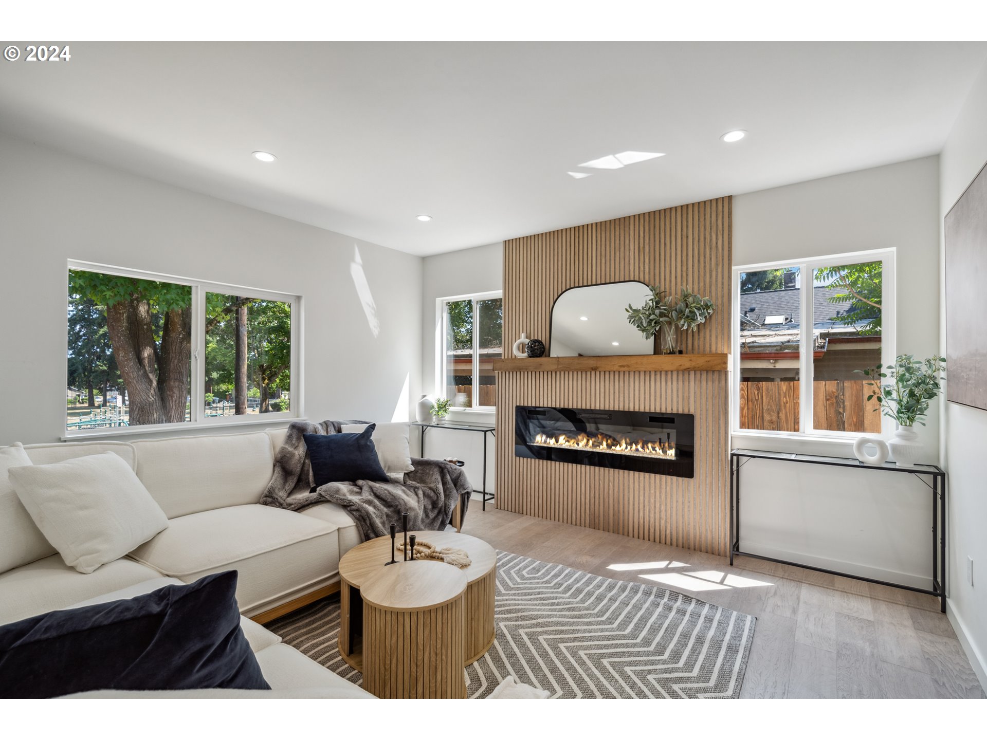 2904 R Street Vancouver, WA 98663 - Photo 5 of 46 a living room with furniture and a fireplace