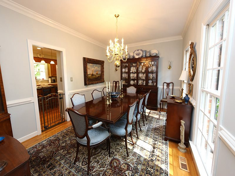 321 Jellison Court Raleigh, NC 27615 - Photo 4 of 24 Chairrail, Crown Molding and Hardwood Floors Formal Dining Room