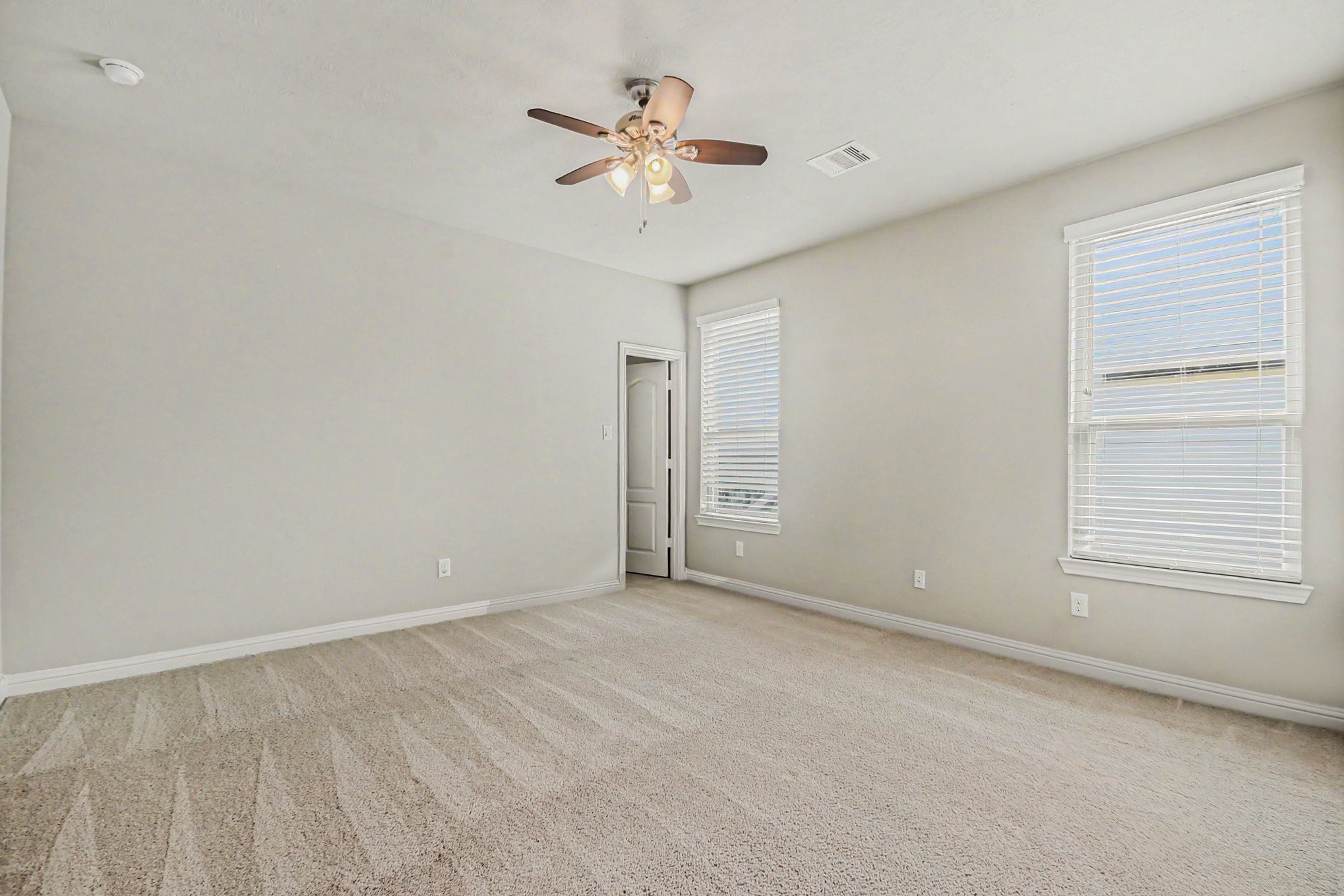 3310 Ralston Edge Lane Houston, TX 77059 - Photo 35 of 50 wooden floor in an empty room with a window