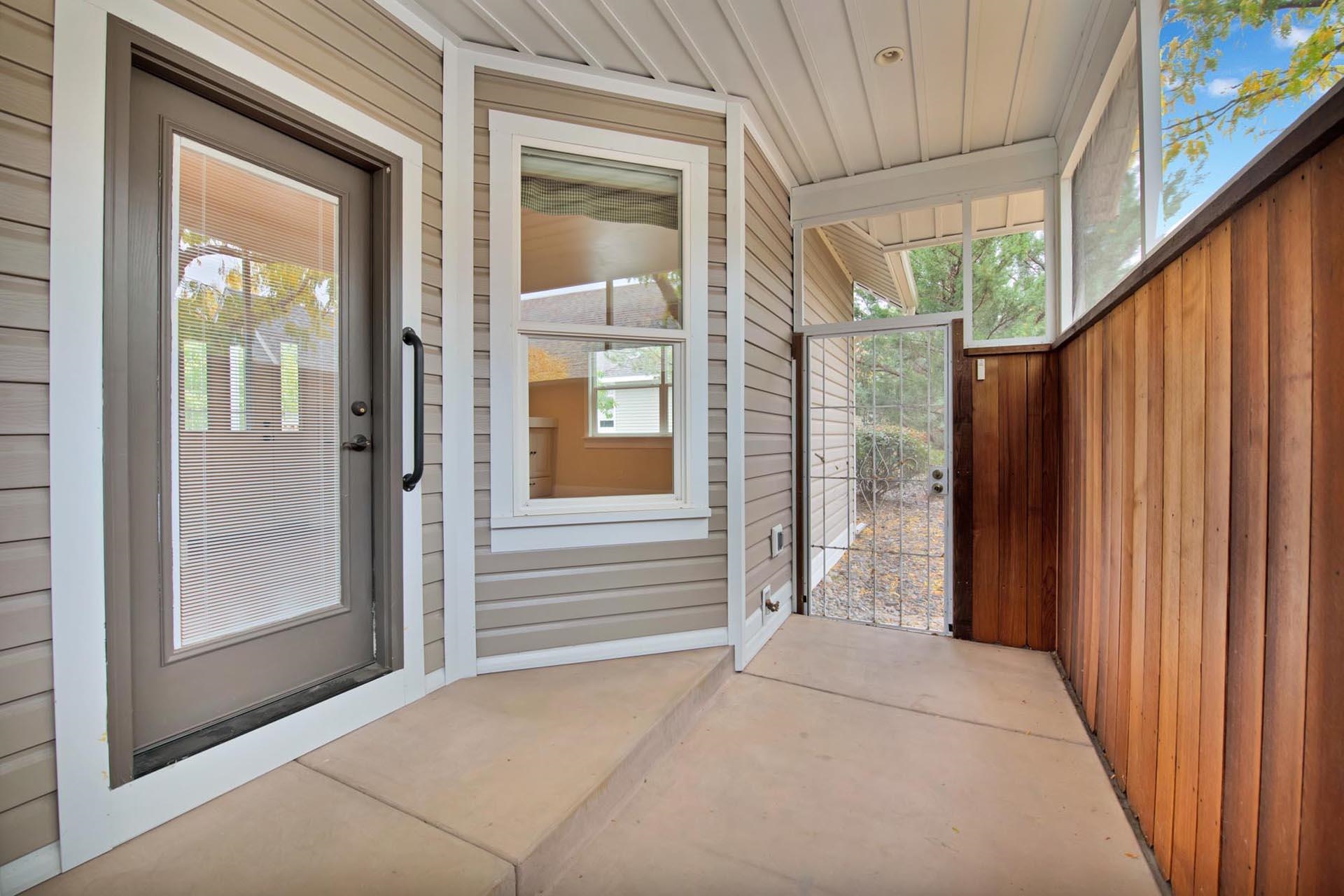 1112 Sunrose Lane, Unit 324 Fruita, CO 81521 - Photo 20 of 21 a view of a house with a backyard