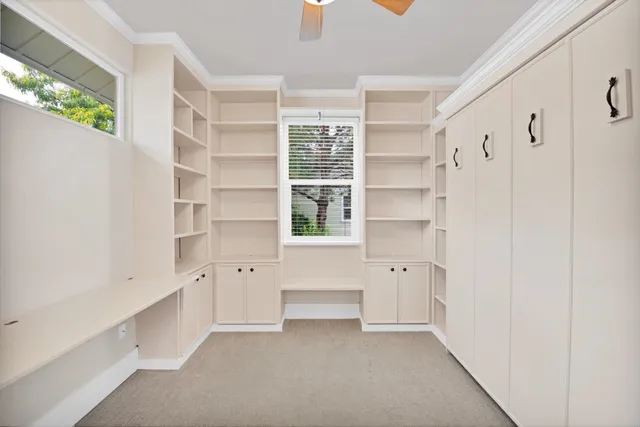 a view of an empty walk in closet