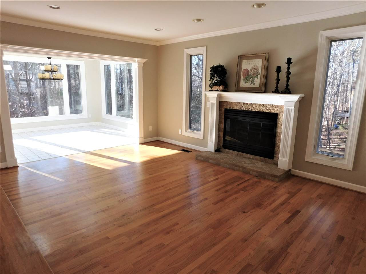 1308 Bascomb Drive Raleigh, NC 27614 - Photo 4 of 25 Beautiful Hardwood Flooring,Gas Logs w/Remote Control,Updated Tile Surround! Open To Sunroom! Family Room
