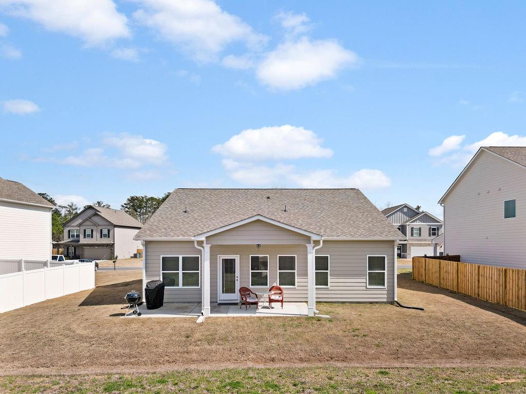 9 Mossy Oaks Lane Northeast Rome, GA 30165 - Photo 5 of 32 a front view of a house with a yard
