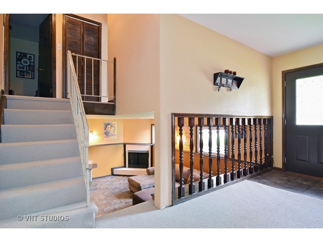 515 Redwood Road Bolingbrook, IL 60440 - Photo 2 of 15 a view of a livingroom with furniture and staircase
