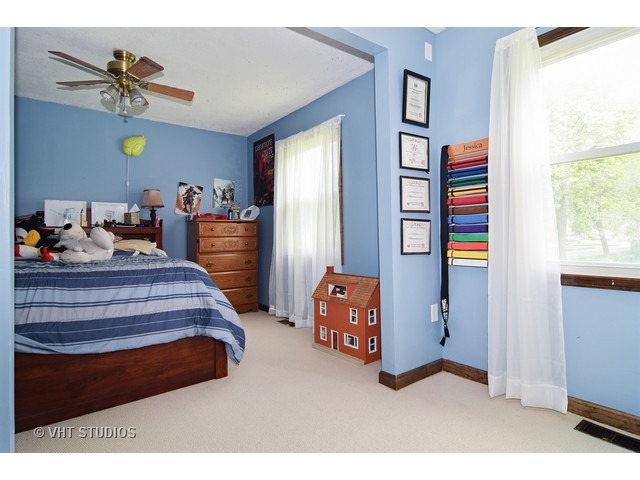 515 Redwood Road Bolingbrook, IL 60440 - Photo 11 of 15 a bedroom with furniture and a window