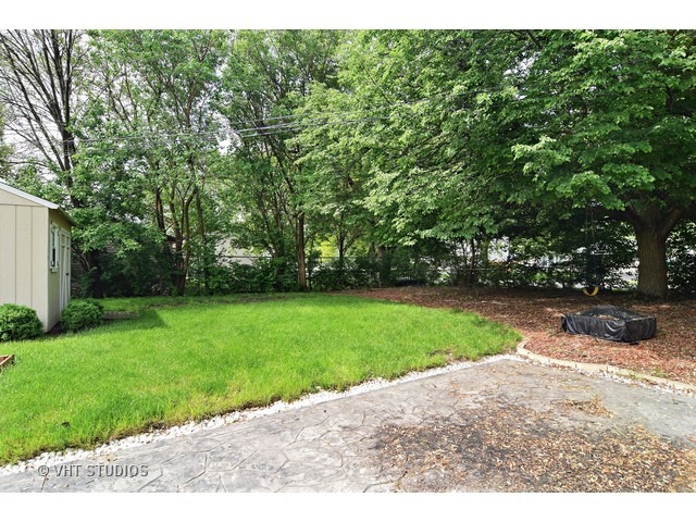 515 Redwood Road Bolingbrook, IL 60440 - Photo 15 of 15 a view of a yard with a tree