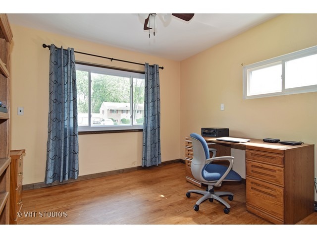 515 Redwood Road Bolingbrook, IL 60440 - Photo 9 of 15 a workspace with furniture and a window