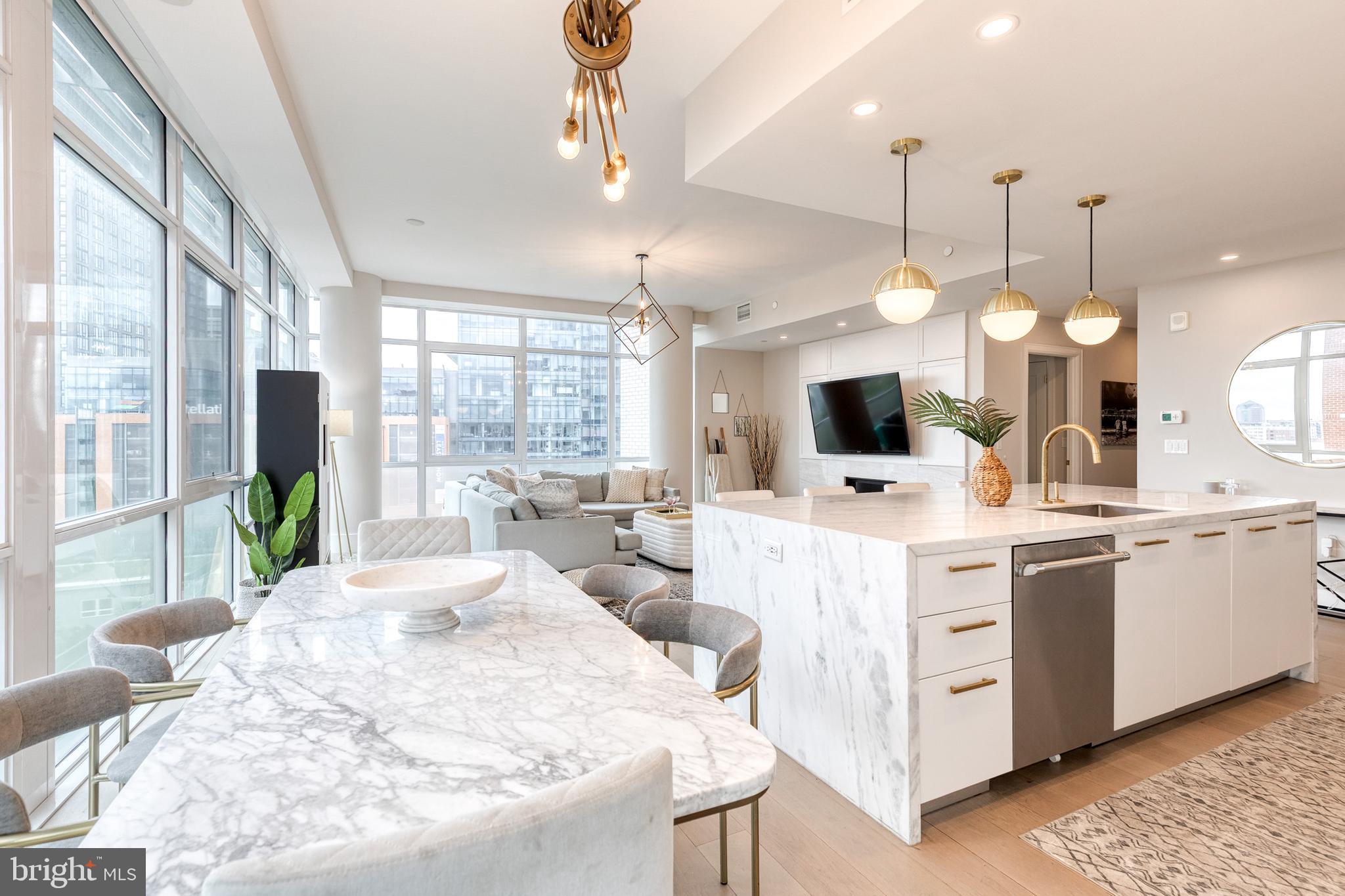 1330 Lancaster Street, Unit C701 Baltimore, MD 21231 - Photo 20 of 73 a large white kitchen with a large window