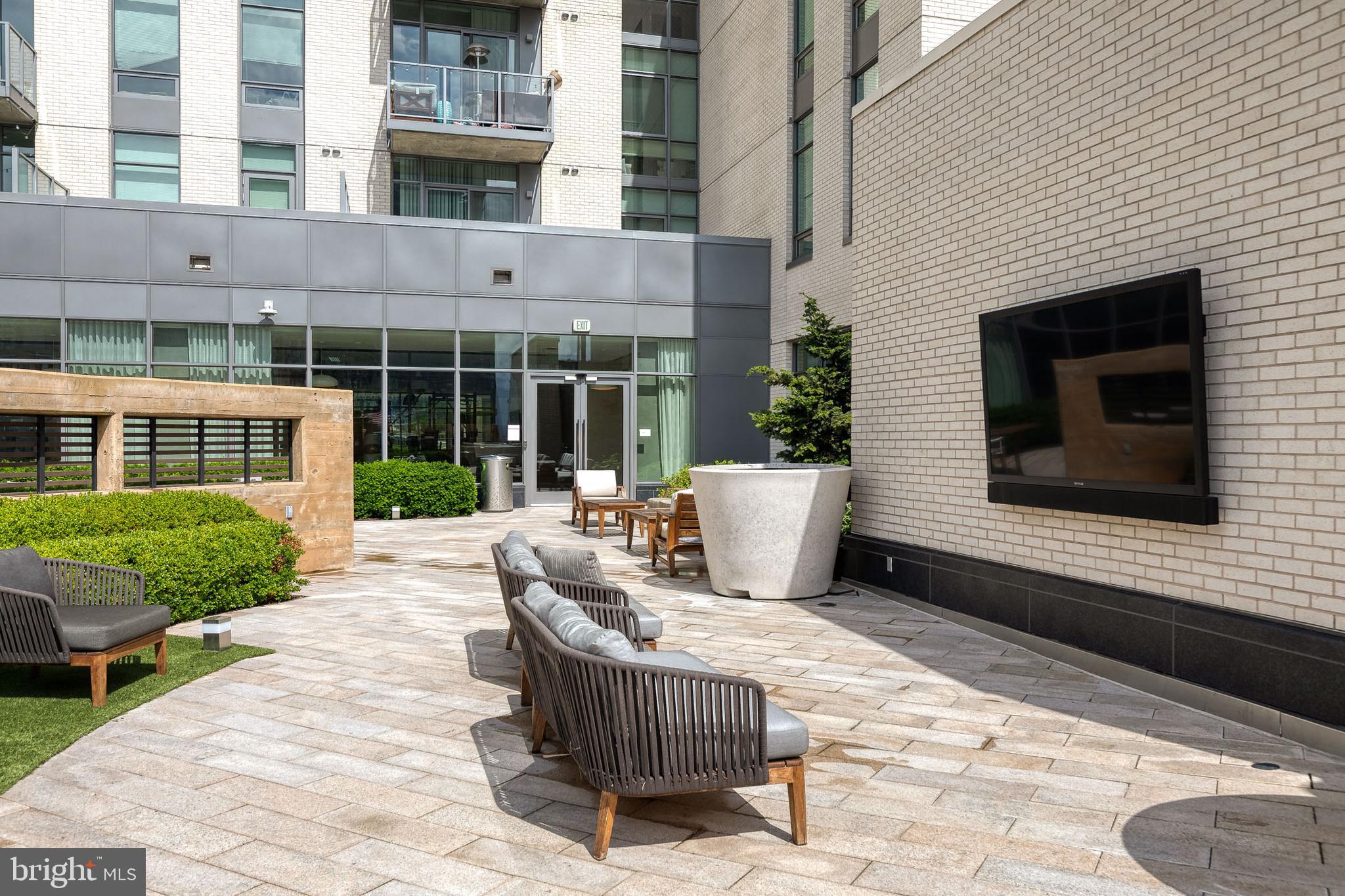 1330 Lancaster Street, Unit C701 Baltimore, MD 21231 - Photo 60 of 73 a view of house with backyard outdoor seating and barbeque oven