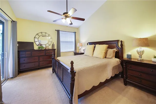 a bedroom with bed and window