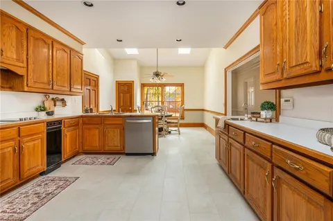 a view of a house with a potted plant and a window