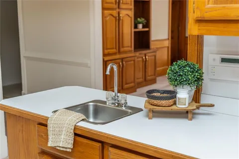 a view of a balcony with wooden floor