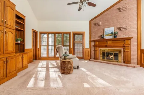 a view of a roof deck with wooden floor and fence