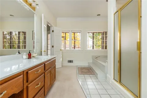 a front view of house with yard and trees