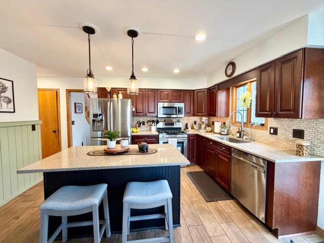 1325 Foxpointe Drive Sycamore, IL 60178 - Photo 14 of 55 a large kitchen with lots of counter space and sink
