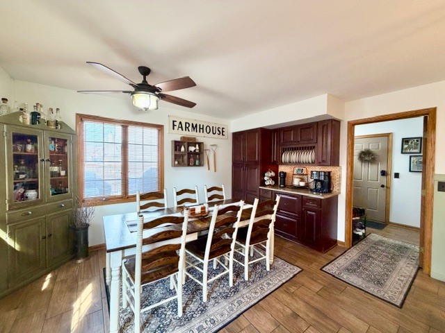 1325 Foxpointe Drive Sycamore, IL 60178 - Photo 19 of 55 a view of a dining room with furniture window and wooden floor