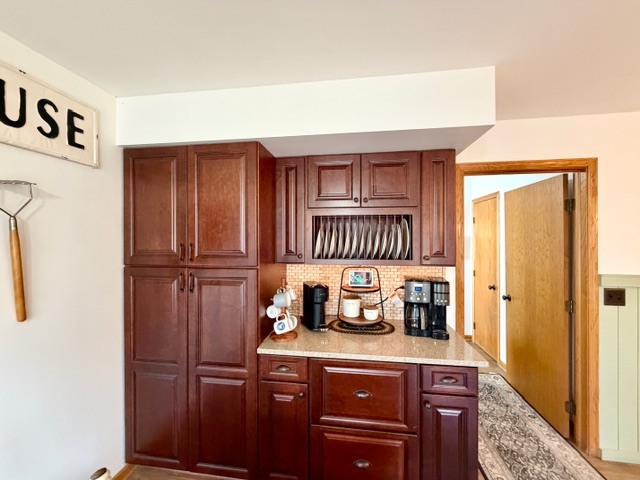 1325 Foxpointe Drive Sycamore, IL 60178 - Photo 20 of 55 a kitchen with a refrigerator and a stove