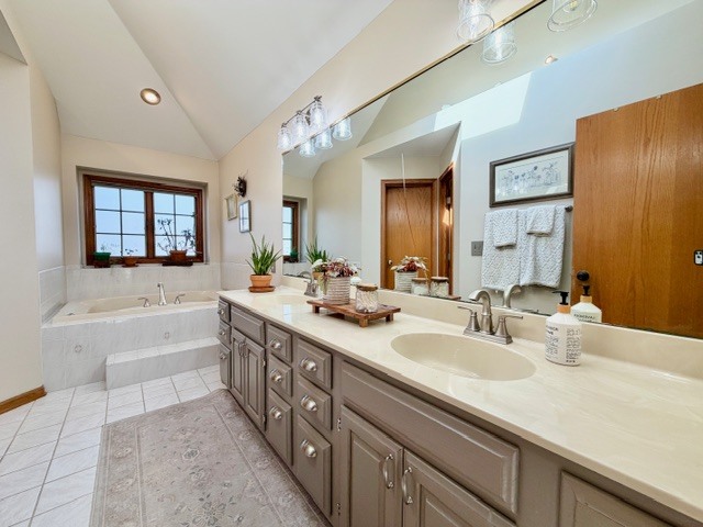 1325 Foxpointe Drive Sycamore, IL 60178 - Photo 27 of 55 a spacious bathroom with a double vanity sink mirror double and bathtub