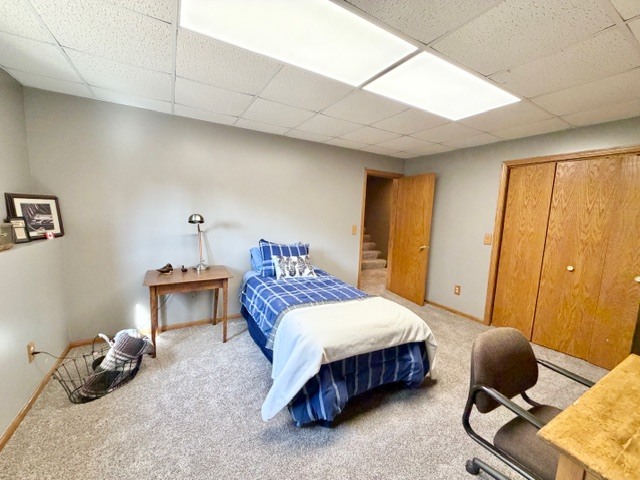 1325 Foxpointe Drive Sycamore, IL 60178 - Photo 39 of 55 a bedroom with a bed a table and chair