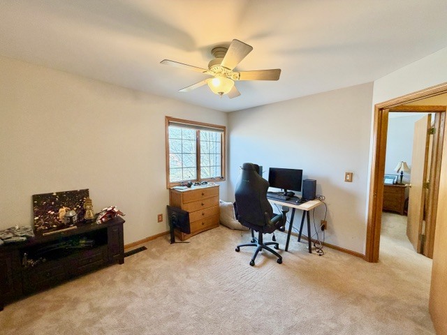 1325 Foxpointe Drive Sycamore, IL 60178 - Photo 41 of 55 a view of a workspace with furniture and a window