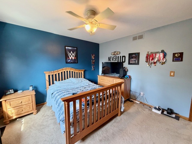 1325 Foxpointe Drive Sycamore, IL 60178 - Photo 42 of 55 a bedroom with furniture and a window