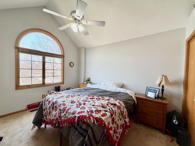 1325 Foxpointe Drive Sycamore, IL 60178 - Photo 45 of 55 a bedroom with a bed and a chandelier