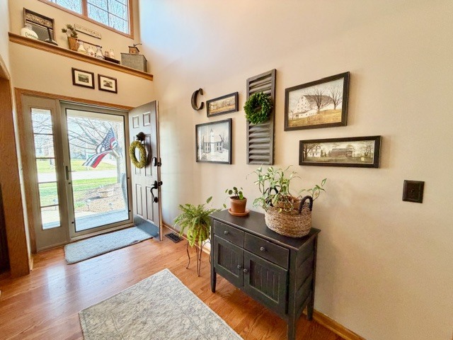 1325 Foxpointe Drive Sycamore, IL 60178 - Photo 5 of 55 a living room with furniture and a gate