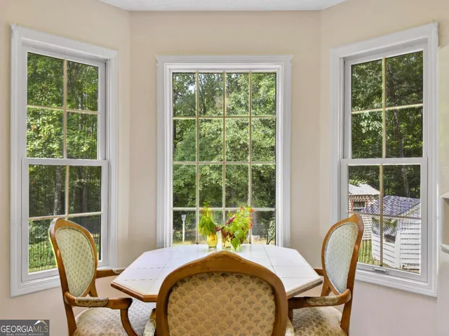 a room with a furniture and a window