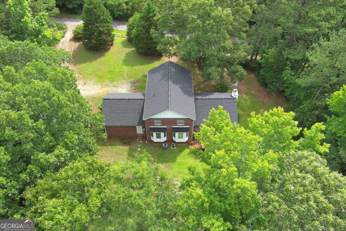 240 Riverview Road Jackson, GA 30233 - Photo 58 of 79 an aerial view of a house with swimming pool and garden