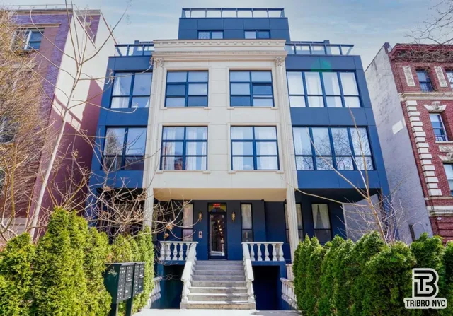 a front view of a multi story building