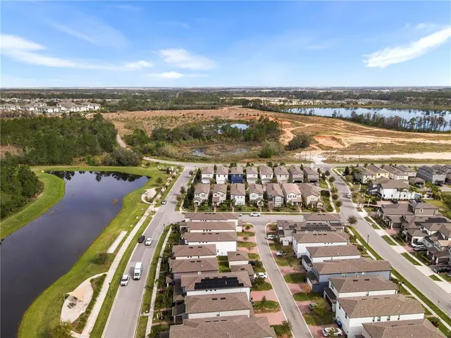 a view of a city with an ocean view