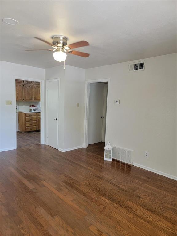 2223 Anderson Street Irving, TX 75062 - Photo 3 of 9 a view of livingroom with hardwood floor and ceiling fan