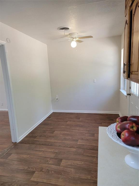 2223 Anderson Street Irving, TX 75062 - Photo 4 of 9 a view of a room with an empty space and a window