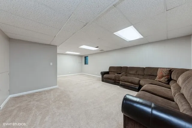 a living room with furniture and a couch