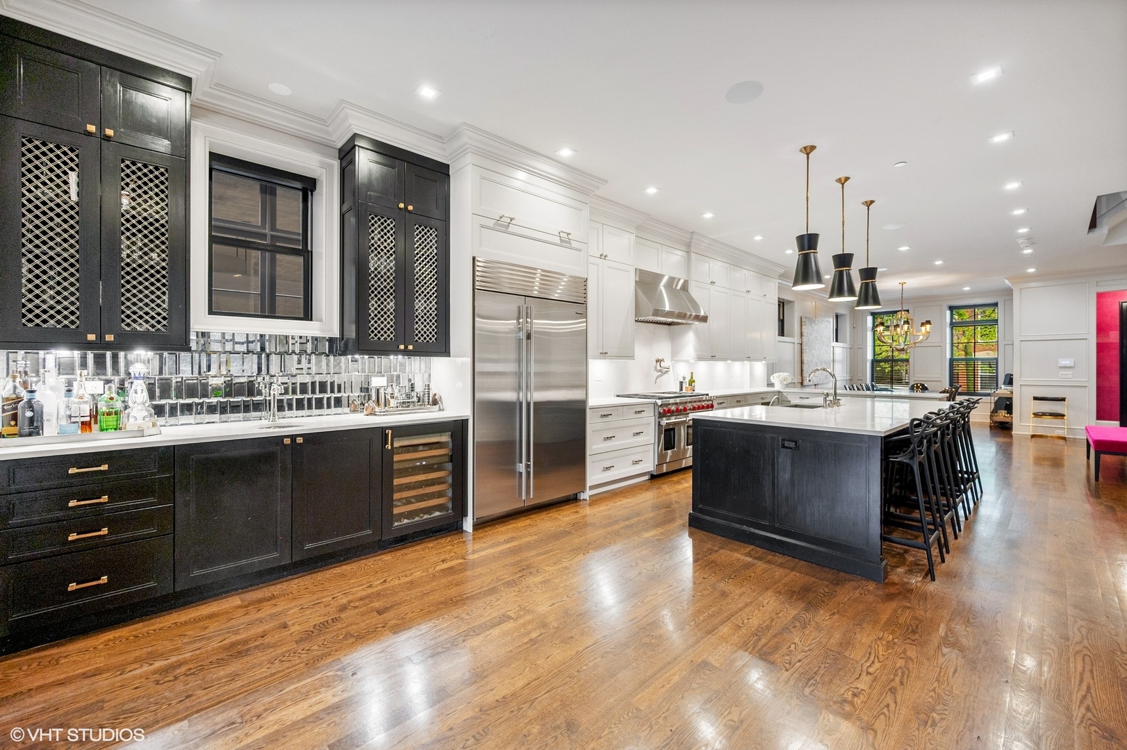 1855 North Dayton Street Chicago, IL 60614 - Photo 12 of 51 a large kitchen with stainless steel appliances kitchen island granite countertop a large counter top stainless steel appliances and cabinets