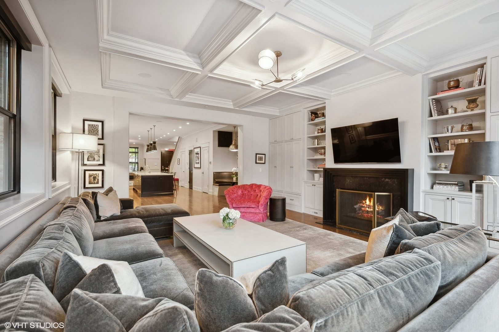 1855 North Dayton Street Chicago, IL 60614 - Photo 15 of 51 a living room with furniture a fireplace and a flat screen tv