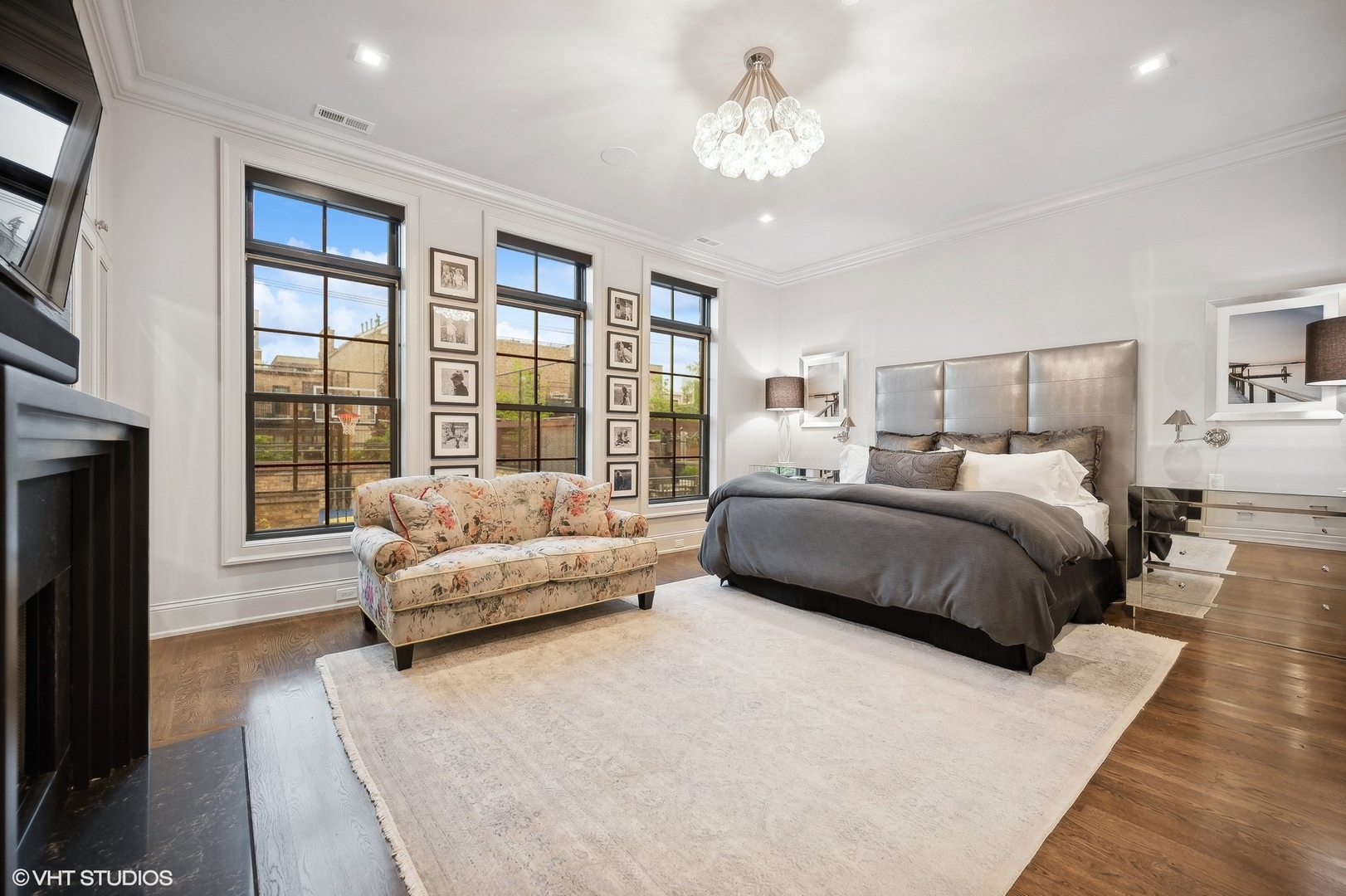 1855 North Dayton Street Chicago, IL 60614 - Photo 24 of 51 a spacious bedroom with a large bed and a couch