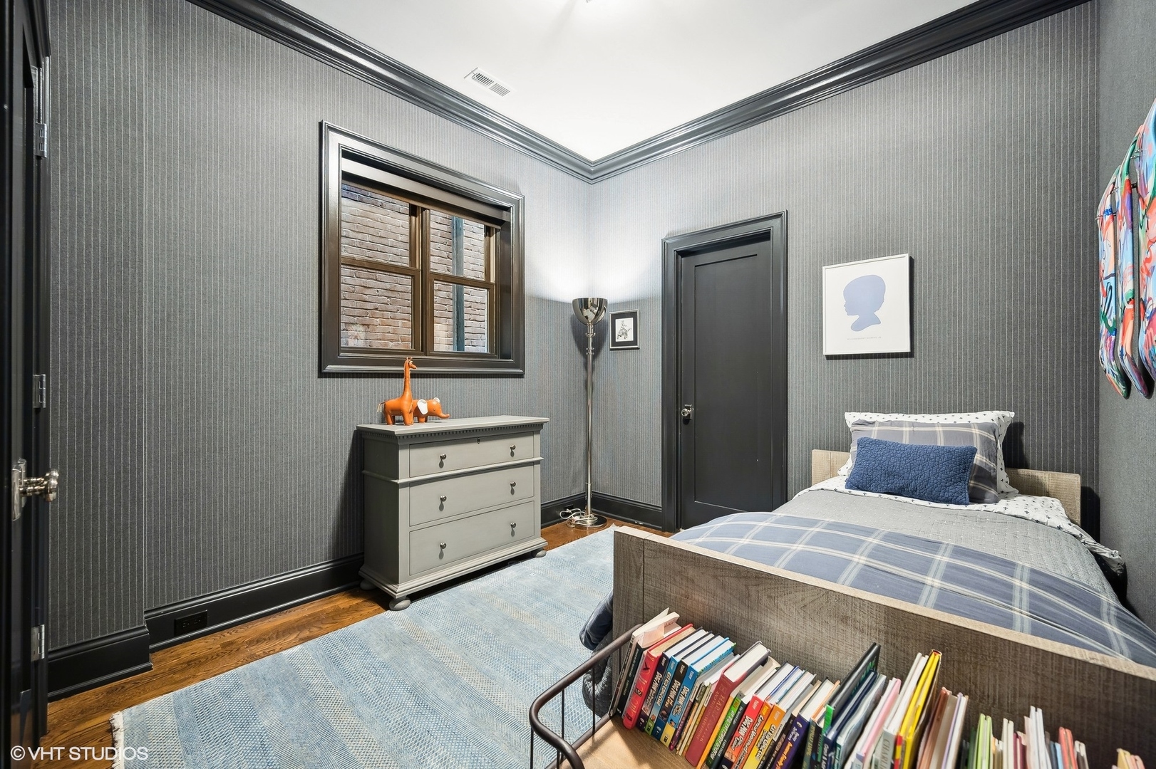 1855 North Dayton Street Chicago, IL 60614 - Photo 30 of 51 a bedroom with a bed and a dresser in it